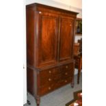 19th century mahogany press with reeded moulding, the upper section opening to reveal six dressing