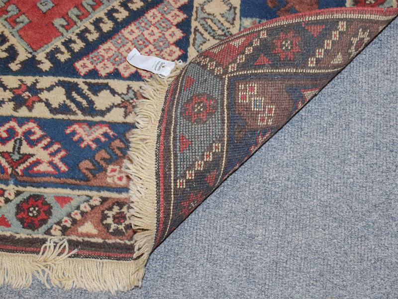An Afghan Baluch rug the field with columns of barber poles beneath the Mihrab enclosed by triple - Image 6 of 6