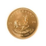 South Africa, 1974 Krugerrand. 1 oz. 24ct (.999). Obv: Bust of Paul Kruger left. Rev: Springbok,