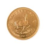 South Africa, 1974 Krugerrand. 1 oz. 24ct (.999). Obv: Bust of Paul Kruger left. Rev: Springbok,