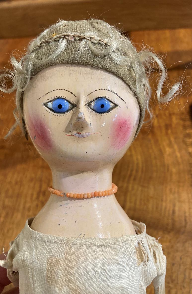A Late 18th Century Queen Anne Type Doll, with a carved wooden head, blonde wig, wide carved eyes - Image 27 of 30