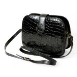 Cartier Black Leather and Patent Shoulder Bag, with leather flap impressed with Cartier logo and