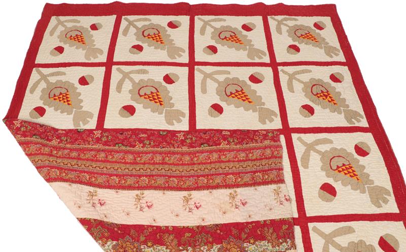 19th Century Applique Reversible Cotton Patchwork Quilt, with a red grid enclosing twenty