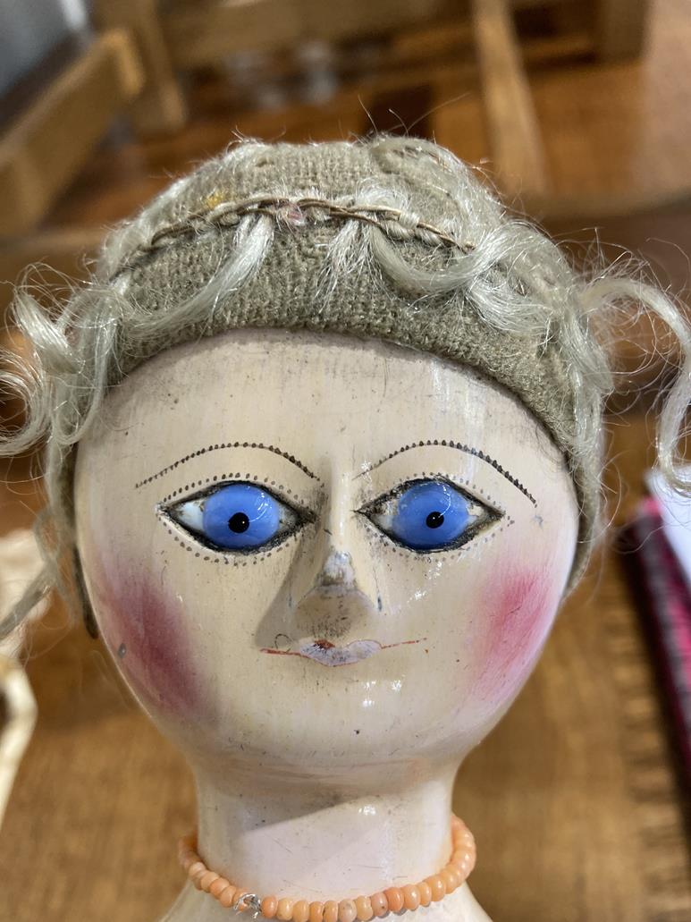 A Late 18th Century Queen Anne Type Doll, with a carved wooden head, blonde wig, wide carved eyes - Image 28 of 30