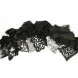Assorted Late 19th Century/Early 20th Century Black Lace, comprising a Chantilly lace flounce (10m