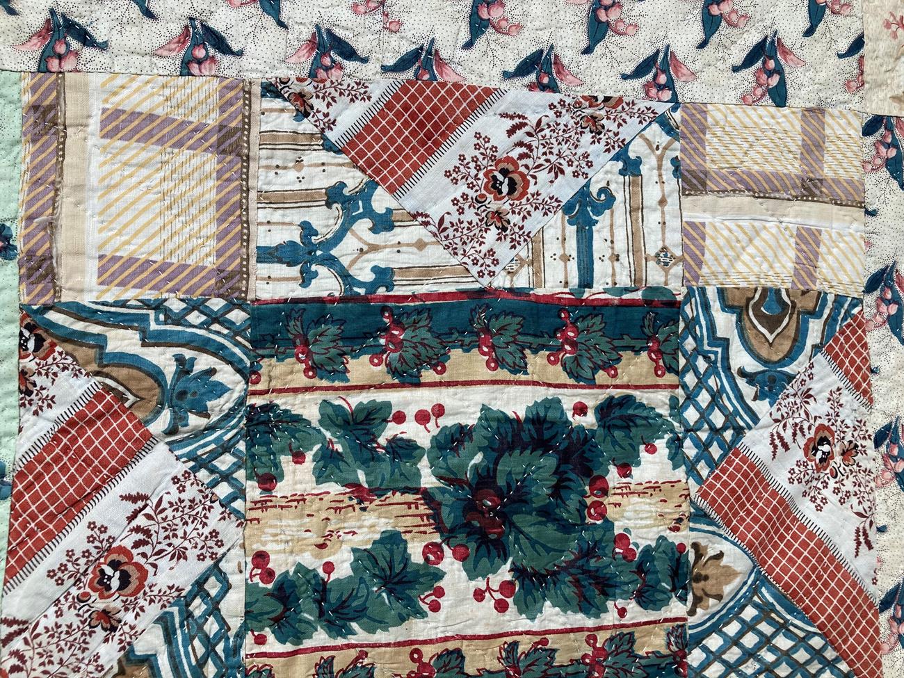 Mid 19th Century Patchwork Quilt, with a central patched square, alternating frames of solid - Image 7 of 10