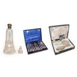 Cased silver three-piece dressing table set, a cased set of six silver handled cake knives and