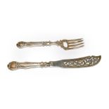 Pair of Victorian silver fish servers, Sheffield, circa 1860, the handles filled and stamped with