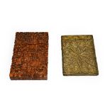 Two card cases, each oblong, comprising: a gilt metal filigree example and a Chinese carved