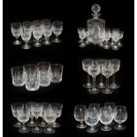 A suite of Thomas Webb cut glass comprising a decanter, six whisky tumblers, six white and six red