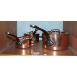 A set of three graduated covered saucepans, copper on stainless steel, stamped Villedieu, 20cm, 14.