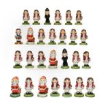 A collection of limited edition Carlton Kids ceramic figures (27)