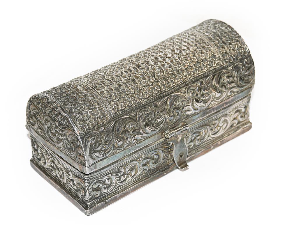 An Indian white metal casket, apparently unmarked, probably late 19th century, oblong and with domed