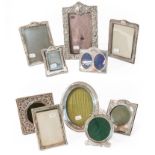 A collection of assorted silver photograph frames, variously decorated (a.f.) (10). Double frame