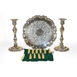 A collection of assorted silver plate, comprising: a pair of candlesticks, a salver, and various