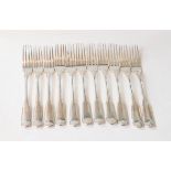 A set of eleven George III silver table forks with single struck Fiddle pattern, engraved with a