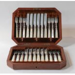 A set of twelve Victorian silver fruit knives with mother of pearl handles by James Deakin & Sons