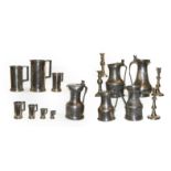 A quantity of 18th century and later pewter including measures, flagons etc (two trays)