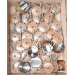 A large quantity of Mauviel copper on stainless steel covered piccolo saucepans, 9cm diameter (one
