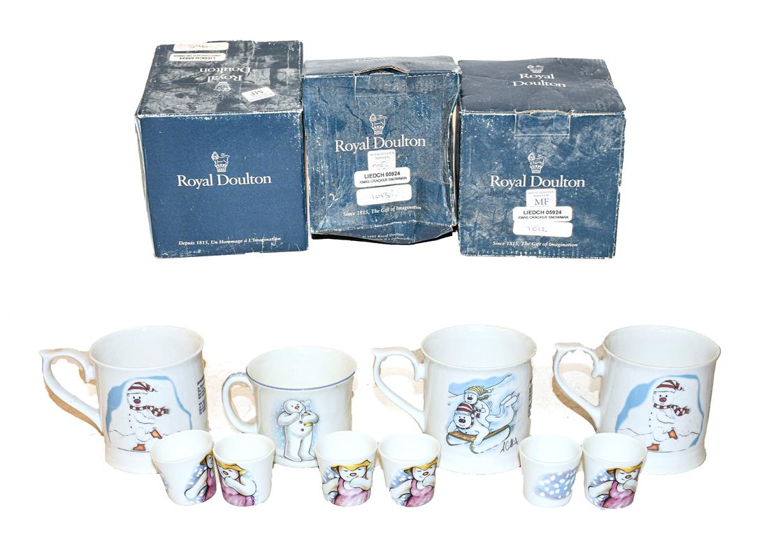 A collection of Snowman items by Royal Doulton and Carlton Ware, including mugs, egg cups etc