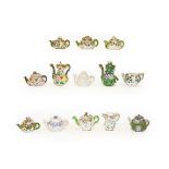 A quantity of mainly 19th century English porcelain miniature teapots and rose water sprinklers, all