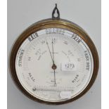 An aneroid wall barometer, retailed by Standring, Bradford, 22.5cm diameter