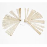 A late 18th century carved ivory Chinese Canton export brise fan, twenty carved sticks with