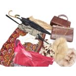A quantity of assorted ladies costume accessories including parasols, fur hats and stoles, hats,