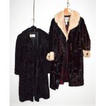 A Continental fur Blackpool black hide coat with white mink trimmed collar and cuffs, Gersten Furs