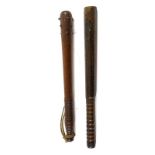 A First World War Mahogany Trench Club/Truncheon, the upper section inset with a lead weight and