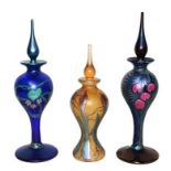 Okra glass, comprising: three iridescent scent bottles, one titled Viola 30/500, 24cm, one title