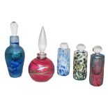 Okra glass comprising five iridescent scent bottles of varying design, tallest 12.5cm (5). Good