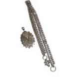 A Victorian silver chain and locket, locket measures 7.0cm by 4.4cm, chain length 46.5cm .
