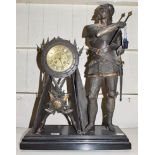 An early 20th century spelter figural mantle clock surmounted by a knight, housing a French movement