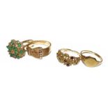 A 9 carat gold emerald and diamond cluster ring, finger size Q (a.f.), a 9 carat gold garnet ring,