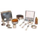 A tray of silver items including a George V silver waiter by Cooper Brothers & Sons Ltd, Sheffield