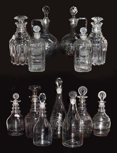 A pair of cut glass decanters engraved 'Holland and Shrub', together with another pair of decanters,