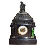 A Victorian black slate and bronze mounted striking mantle clock