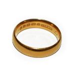 A 22 carat gold band ring, finger size M1/2. Gross weight 6.1 grams.