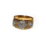 An 18 carat gold diamond ring, the heart motif set throughout with eight-cut diamonds in white