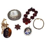 An agate pendant on chain, a garnet bangle, a garnet bracelet, a garnet brooch, a miniature locket/