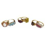 Six 9 carat gold gem set rings, of varying designs and sizes including a smoky quartz example (a.