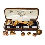 A pair of gold cufflinks, a single 9 carat gold cufflink and seven studs . Three cufflinks - 7.3