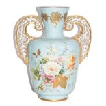 A Crown Derby turquoise ground vase painted with flowers and having reticulated twin handles,