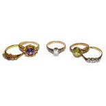 A 9 carat gold amethyst ring, finger size N, a 9 carat gold peridot ring, finger size K and three