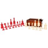 A 19th century carved and turned ivory chess set, the opposing side stained red and in mahogany