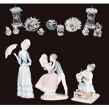 Three Lladro figures including a Geisha, a quantity of Swarovski crystal animals, and a pair of