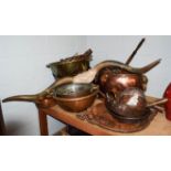 A quantity of antique copper and brass items, to include a coal bucket with lion mask handles,
