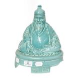 A Doulton & Co. model of a seated Buddha, manufactured for Artandia Ltd