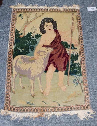 Kashan mat, probably depicting St John The Baptist with a lamb, enclosed by narrow borders, 80cm